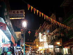 a photo of a street in San Francisco's Chinatown at night
